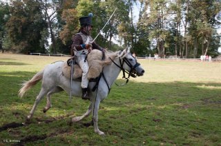 Reconstitution d'un bivouac de la période napoléonienne au château du Passage en Isère. Un cavalier charge